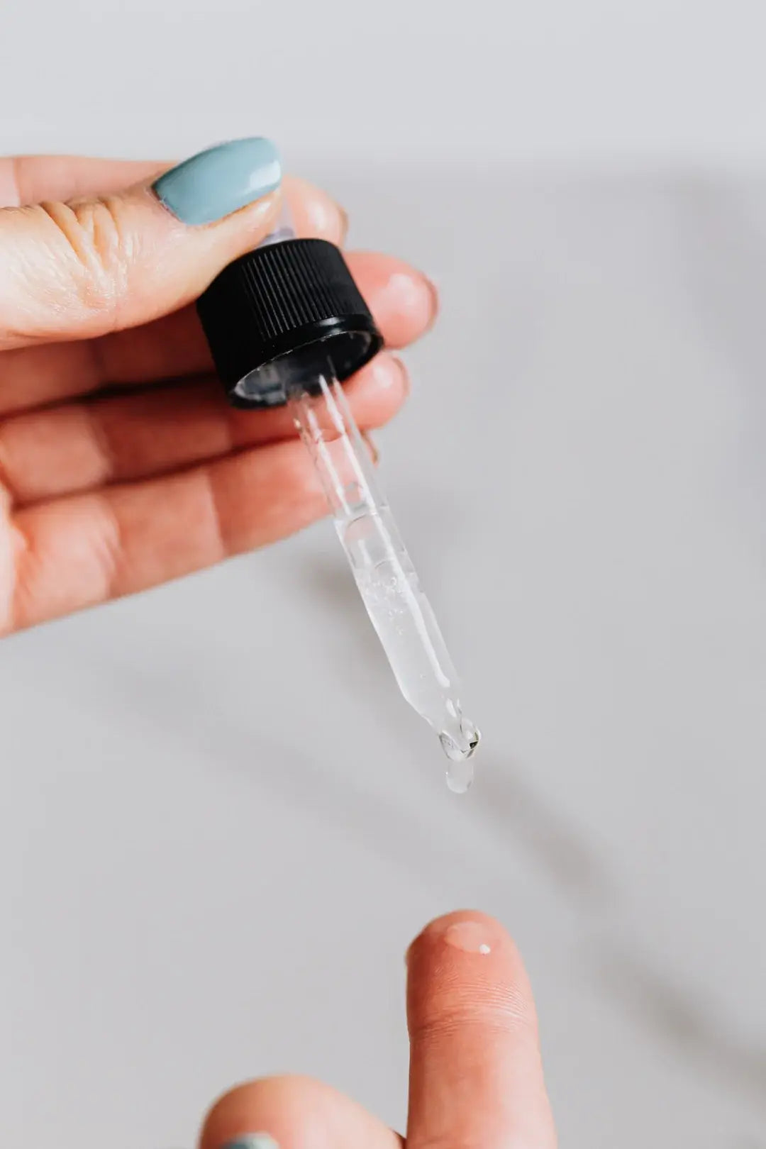 Salicylic Acid drops on the finger