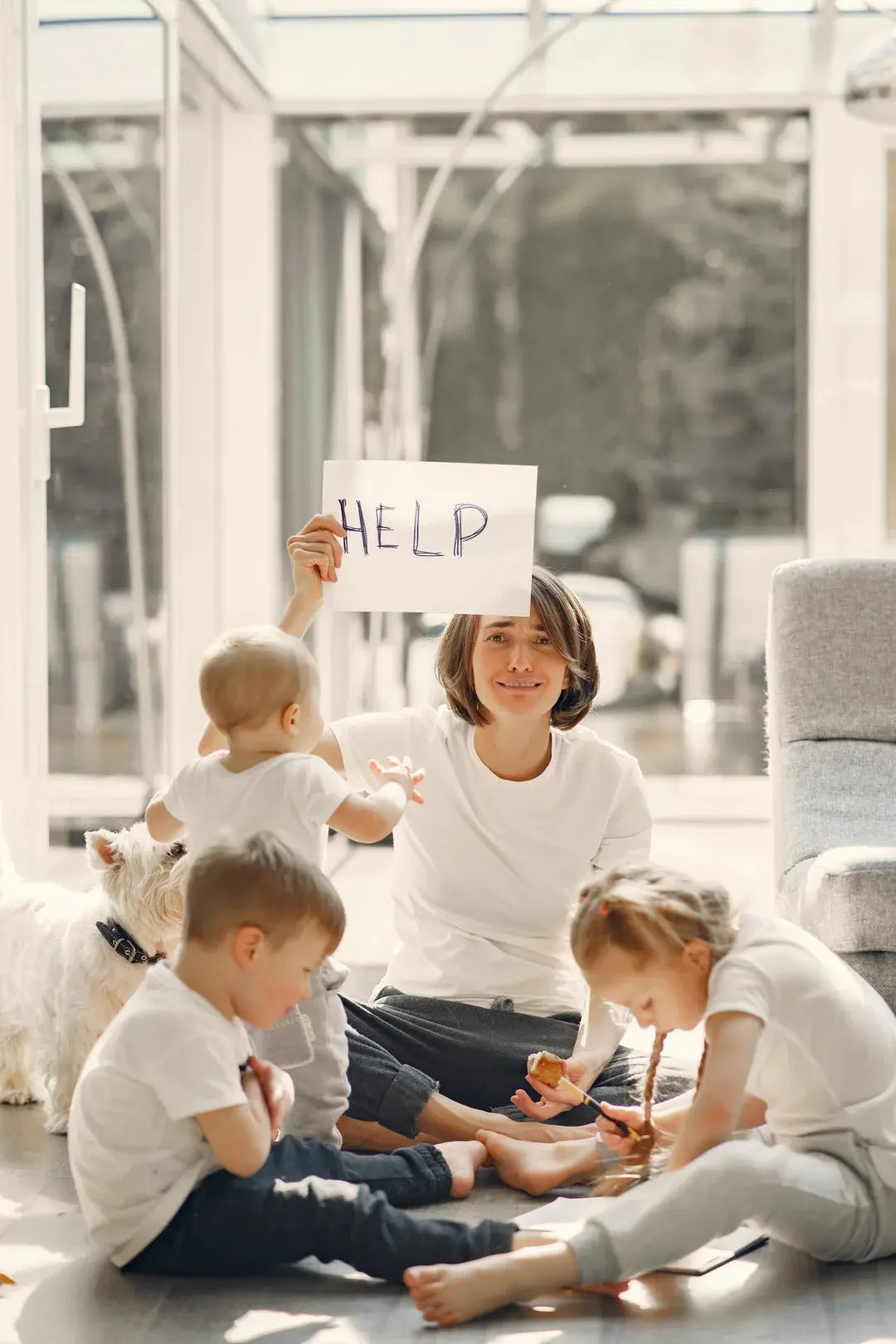 woman stressed by her 3 children