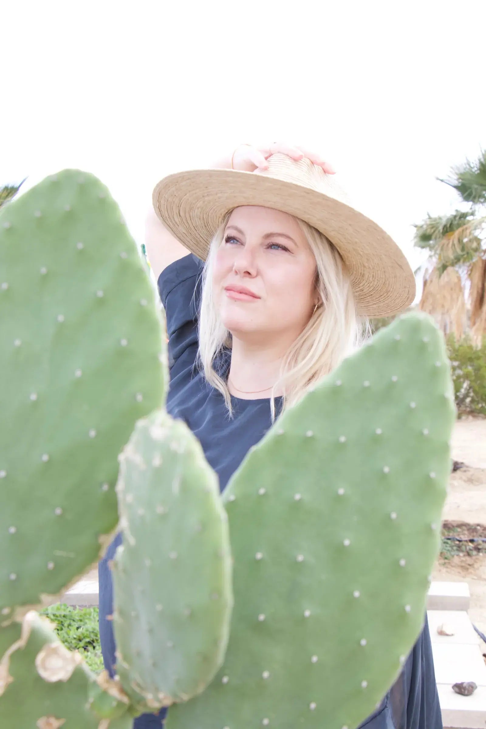 Women inside the prickly pear tree